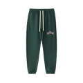Green jogger pants with a brand logo on a white background